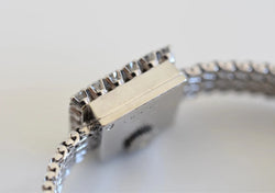Montre JAEGER-LECOULTRE Haute Joaillerie Cal. 426 en or blanc 18 carats et diamants Bracelet Intégré c.1960. - Castafiore