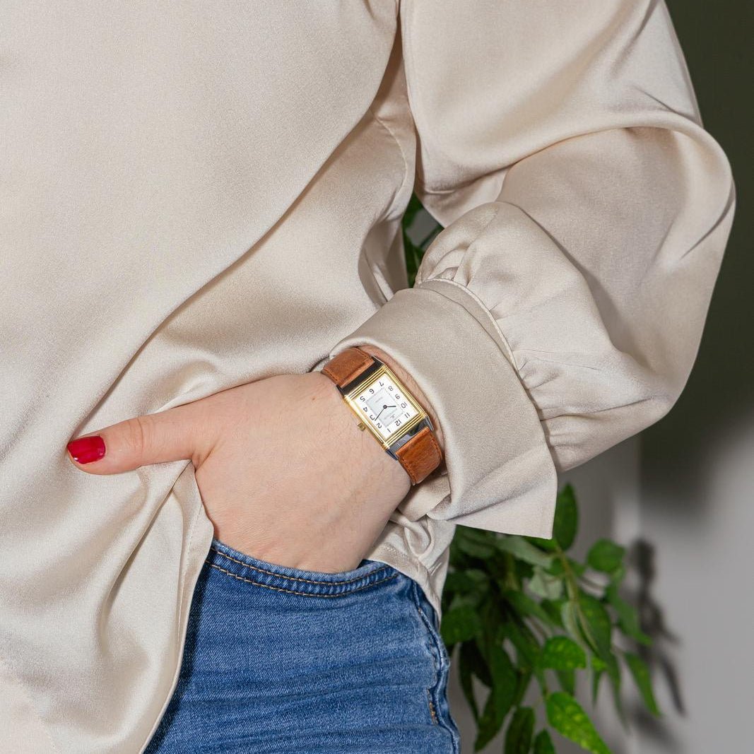 Montre JAEGER - LECOULTRE "Reverso Classique" en or jaune, argent, cuir et acier - Castafiore