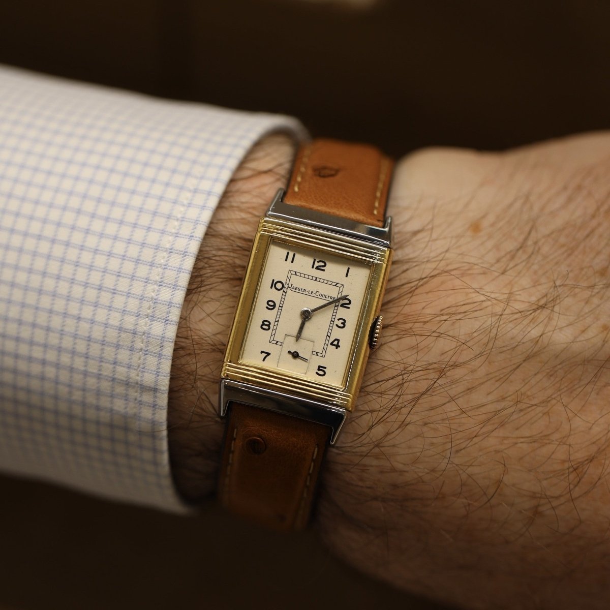 Montre JAEGER-LECOULTRE "Reverso" en or jaune, acier et cuir - Castafiore