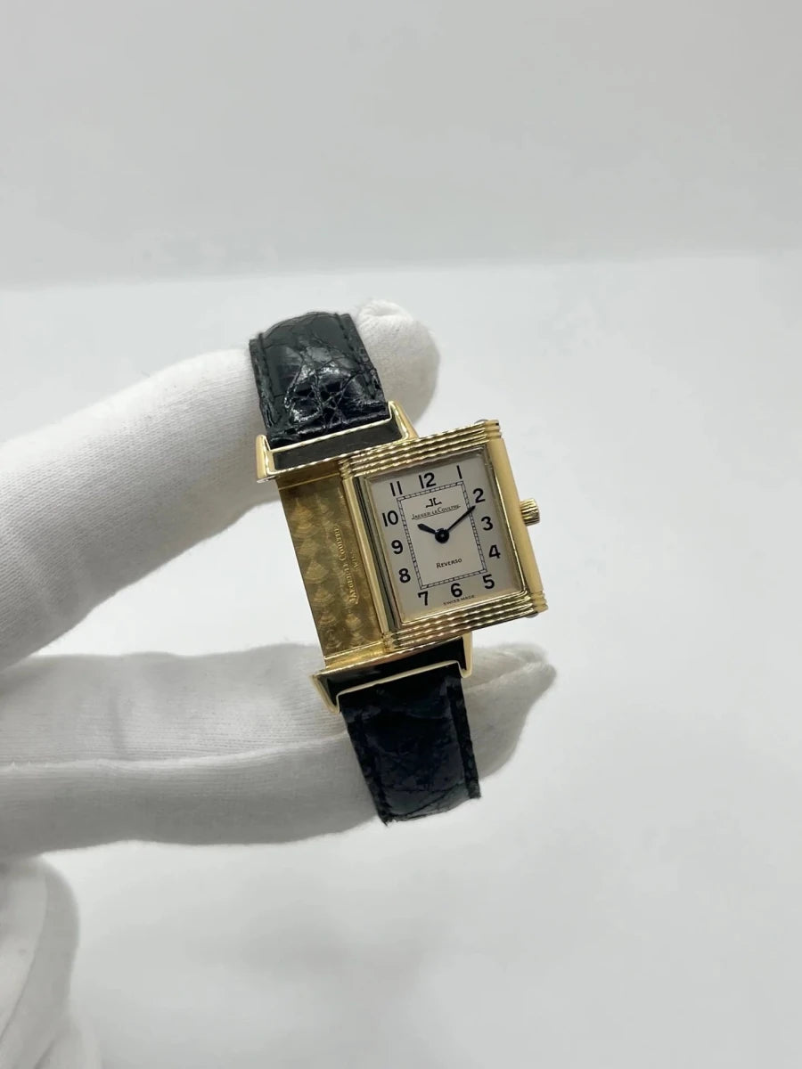 Montre JAEGER-LECOULTRE "Reverso Lady" en or jaune et cuir - Castafiore