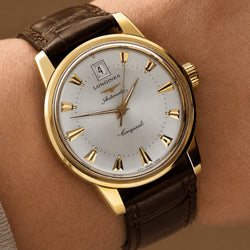 Montre LONGINES "Conquest Heritage" en or jaune et cuir - Castafiore