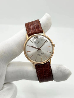 Montre LONGINES "Flagship" en or rose, acier et cuir - Castafiore