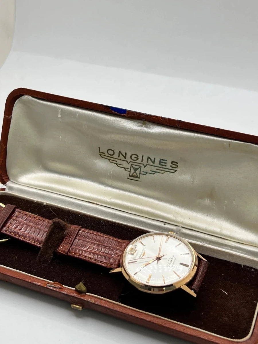 Montre LONGINES "Flagship" en or rose, acier et cuir - Castafiore