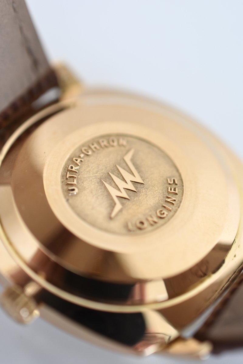 Montre LONGINES "Ultra Chron" en or jaune, argent et cuir - Castafiore