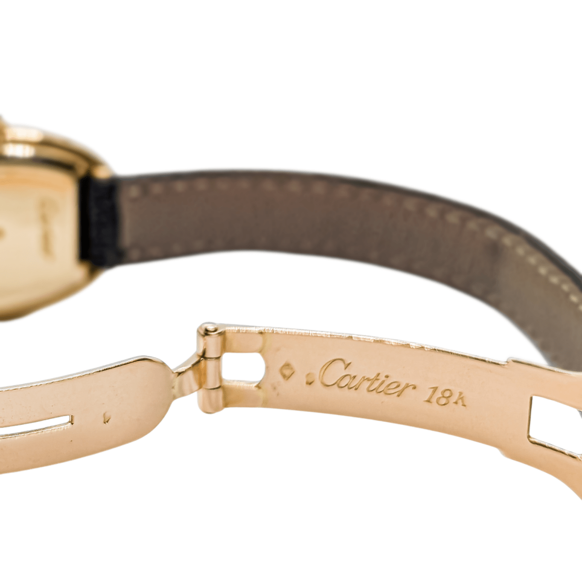 Montre Mécanique CARTIER "Baignoire" en or jaune, cuir et saphir - Castafiore