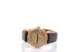 Montre MOVADO "Triple Calendar" en or jaune, plexi et cuir - Castafiore