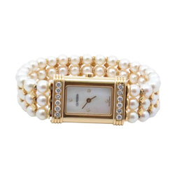 Montre O.J. PERRIN en or jaune, perles et diamants - Castafiore