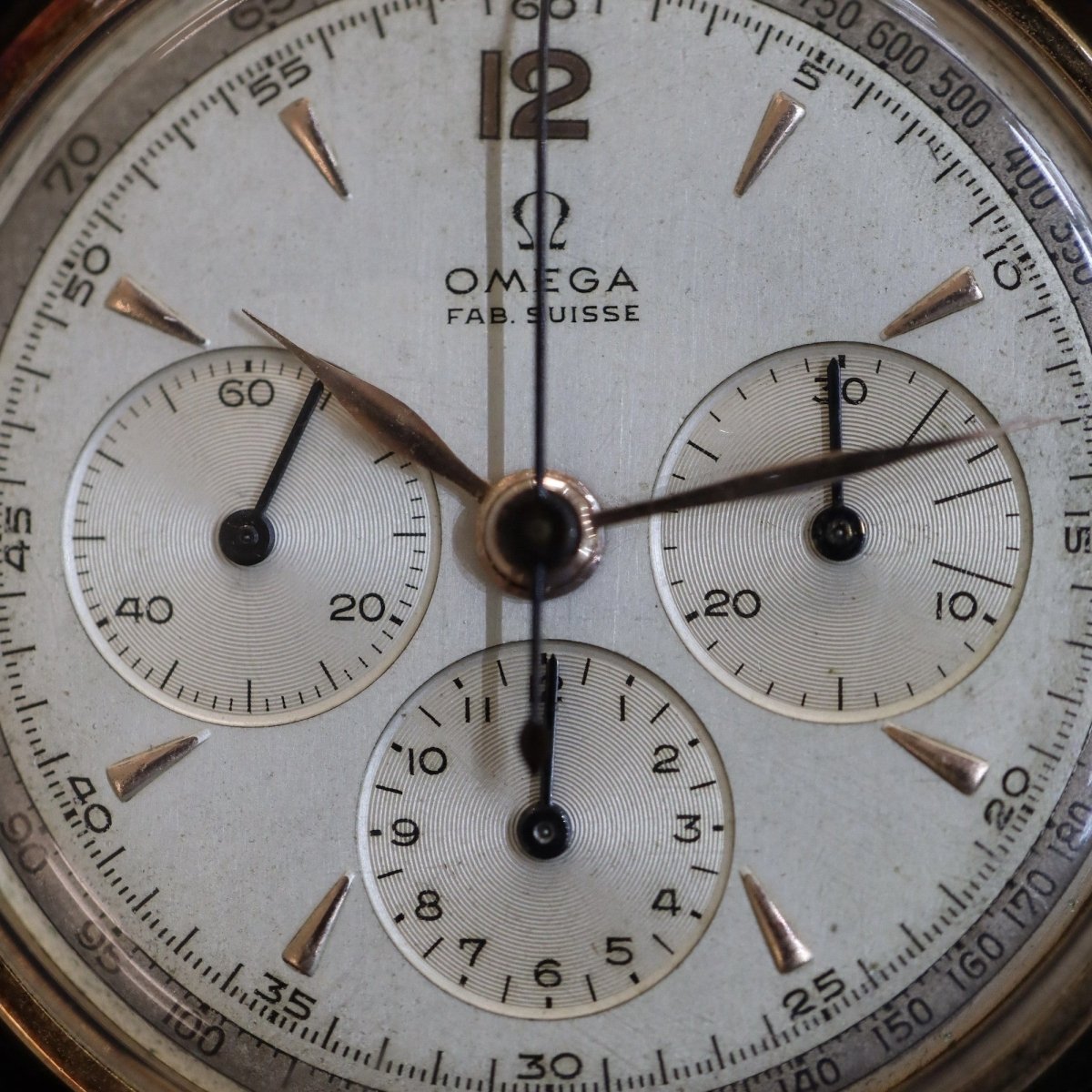 Montre OMEGA Chronographe vintage en or rose - Castafiore