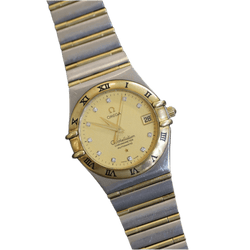 Montre OMEGA "Constellation" en or jaune, acier et automatique - Castafiore
