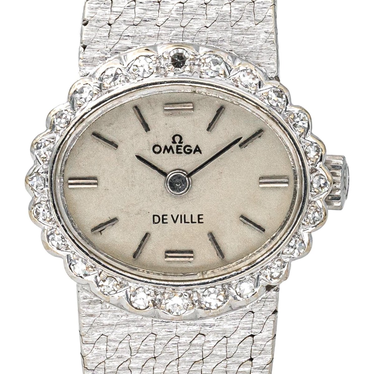 Montre OMEGA "De Ville" en or blanc, argent, saphir et diamant - Castafiore