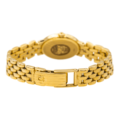 Montre OMÉGA "DeVille" en or jaune, saphir et quartz - Castafiore