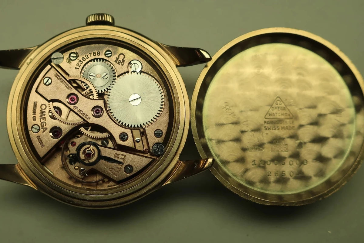 Montre OMÉGA en or jaune et cuir - Castafiore