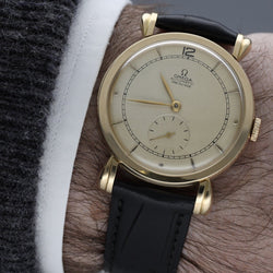 Montre OMEGA en or jaune et cuir - Castafiore