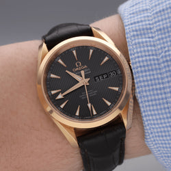 Montre OMEGA en or rose et cuir - Castafiore