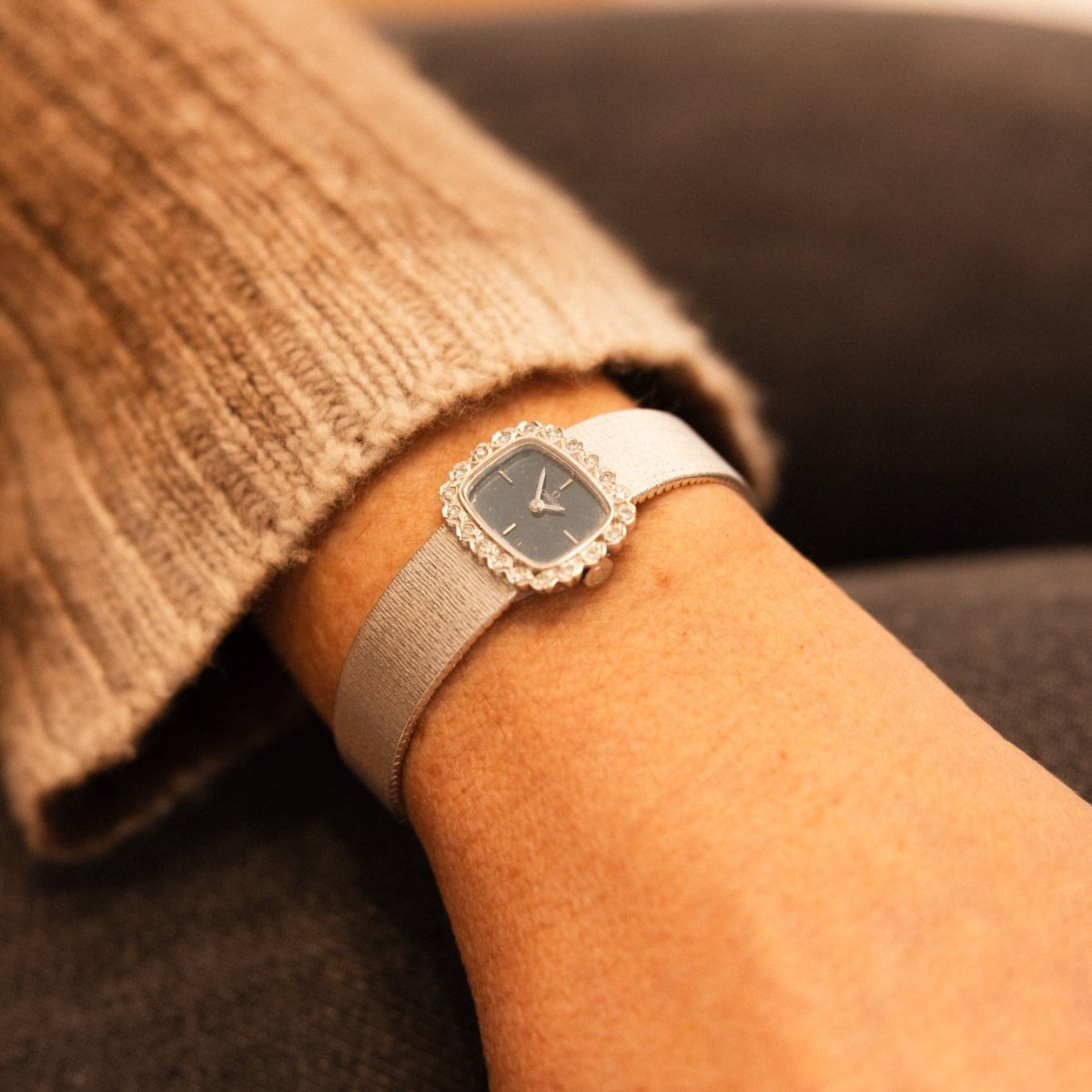 Montre OMEGA or blanc et diamants - Castafiore