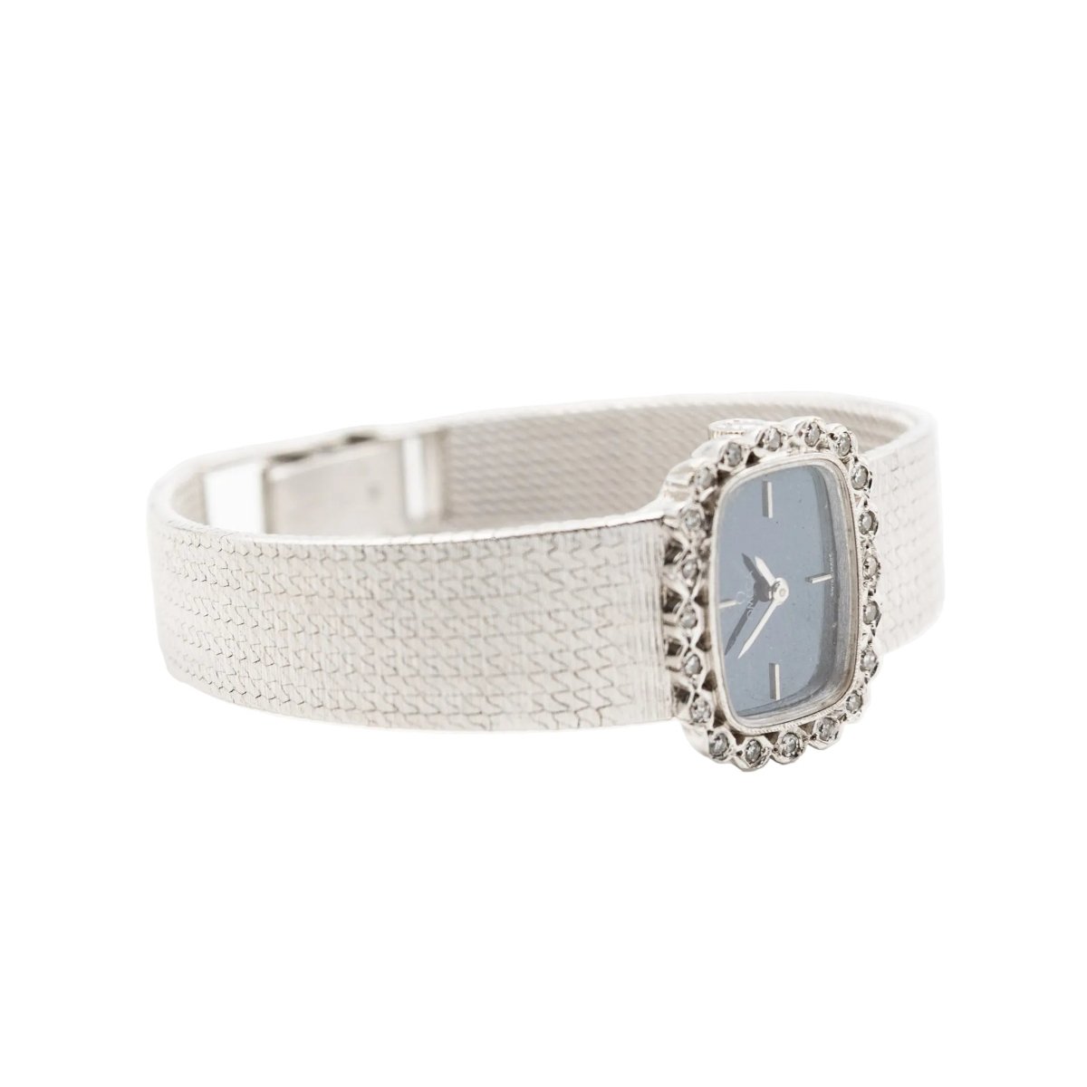 Montre OMEGA or blanc et diamants - Castafiore