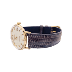 Montre OMEGA "Seamaster De Ville" en or rose, argent et cuir. - Castafiore