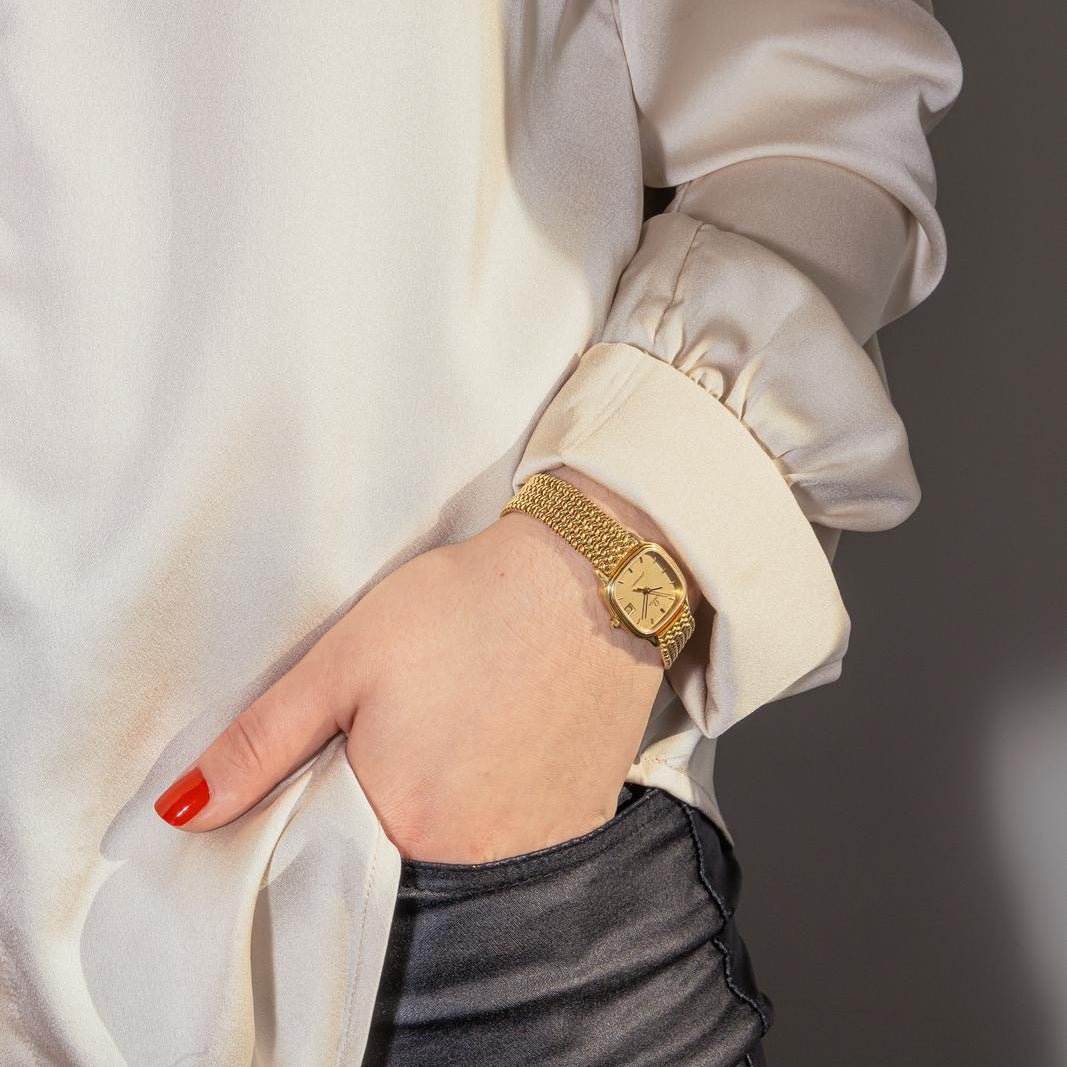 Montre OMEGA "Seamaster" en or jaune et quartz - Castafiore