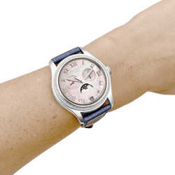 Montre PATEK PHILIPPE "Annual Calendar" en or blanc, cuir et diamants - Castafiore