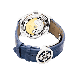 Montre PATEK PHILIPPE "Annual Calendar" en or blanc, cuir et diamants - Castafiore