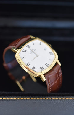 Montre PIAGET Coussin automatique en or jaune - Castafiore