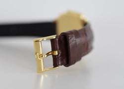 Montre PIAGET "Coussin" en or jaune et cuir - Castafiore