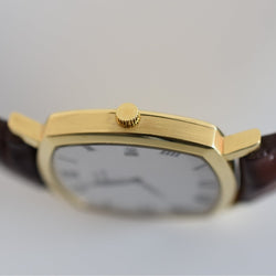 Montre PIAGET "Coussin" en or jaune et cuir - Castafiore