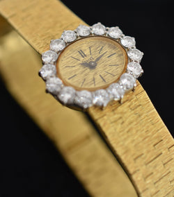 Montre PIAGET en or jaune et diamants - Castafiore