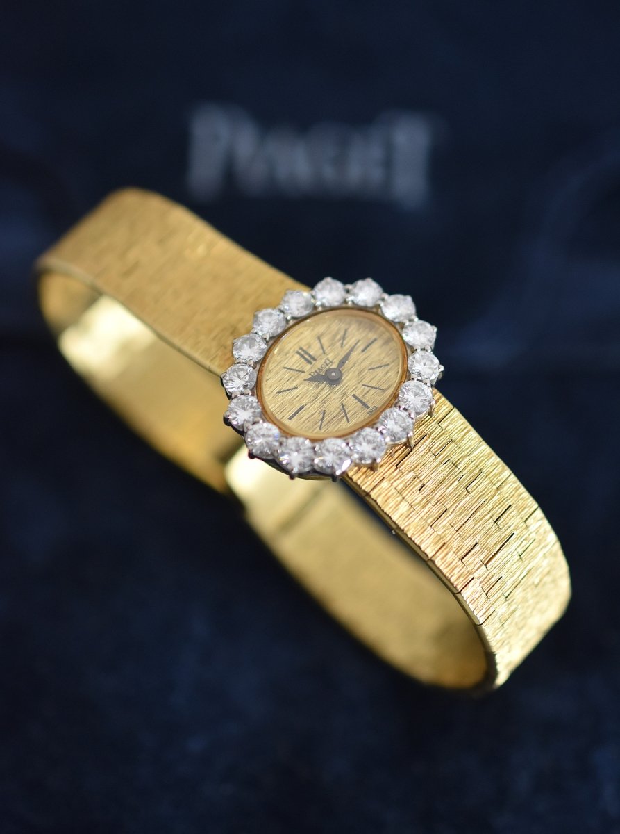 Montre PIAGET en or jaune et diamants - Castafiore