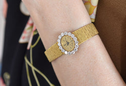 Montre PIAGET en or jaune et diamants - Castafiore