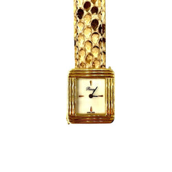 Montre POIRAY, "Ma première" en or jaune et nacre - Castafiore