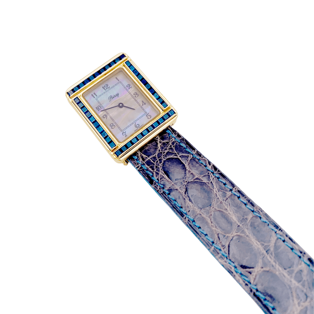 Montre POIRAY "Ma Première" en or jaune, nacre, cuir et saphirs - Castafiore