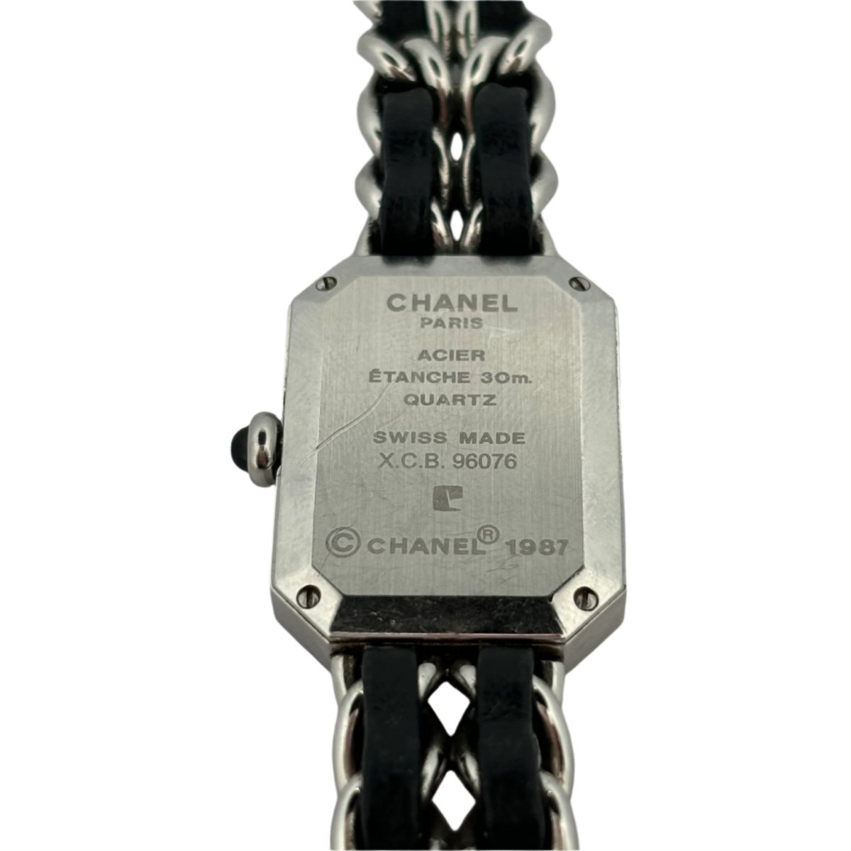 CHANEL “Première” Quartz watch in steel and black leather – Castafiore