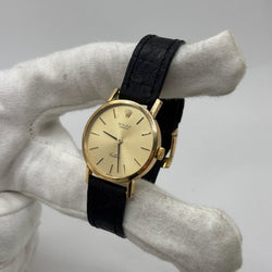 Montre ROLEX "Cellini" en or jaune, acier et cuir - Castafiore