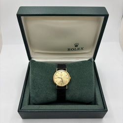 Montre ROLEX "Cellini" en or jaune, acier et cuir - Castafiore