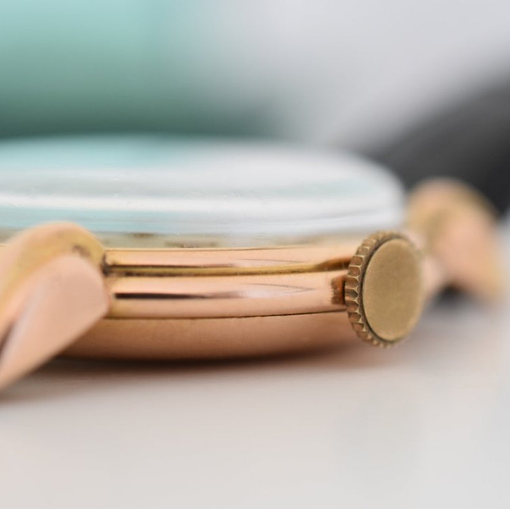 Montre ROLEX "Chronomètre" en or rose, acier et cuir - Castafiore