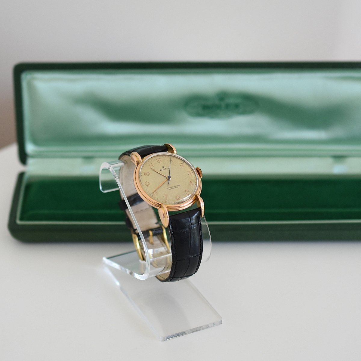 Montre ROLEX "Chronomètre" en or rose, acier et cuir - Castafiore