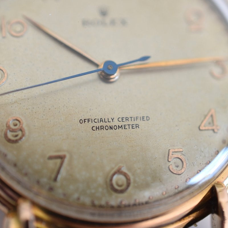 Montre ROLEX "Chronomètre" en or rose, acier et cuir - Castafiore