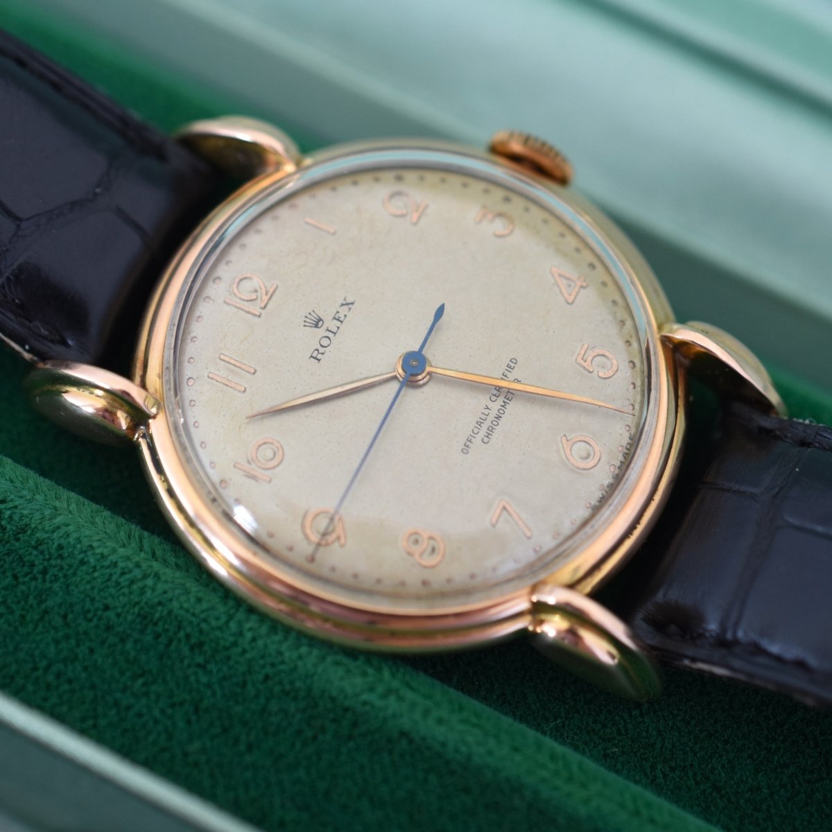 Montre ROLEX "Chronomètre" en or rose, acier et cuir - Castafiore