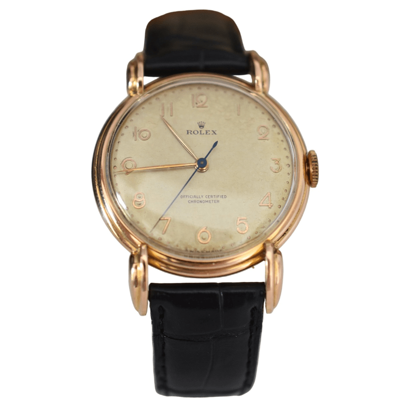 Montre ROLEX "Chronomètre" en or rose, acier et cuir - Castafiore