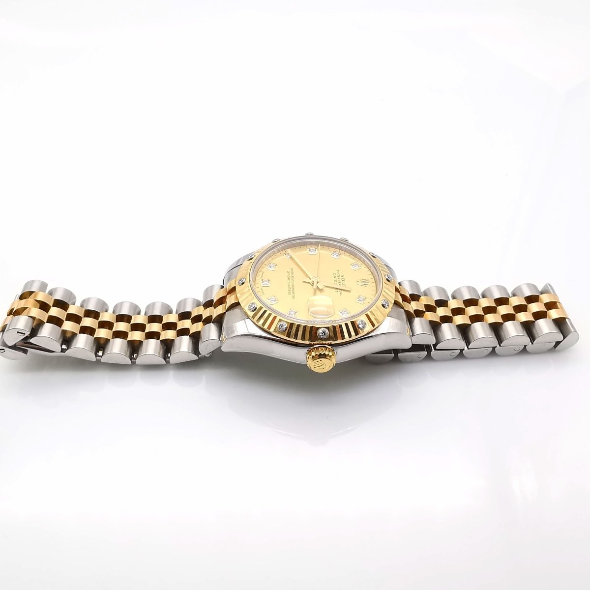 Montre ROLEX "Datejust 31" en or, acier et diamants - Castafiore