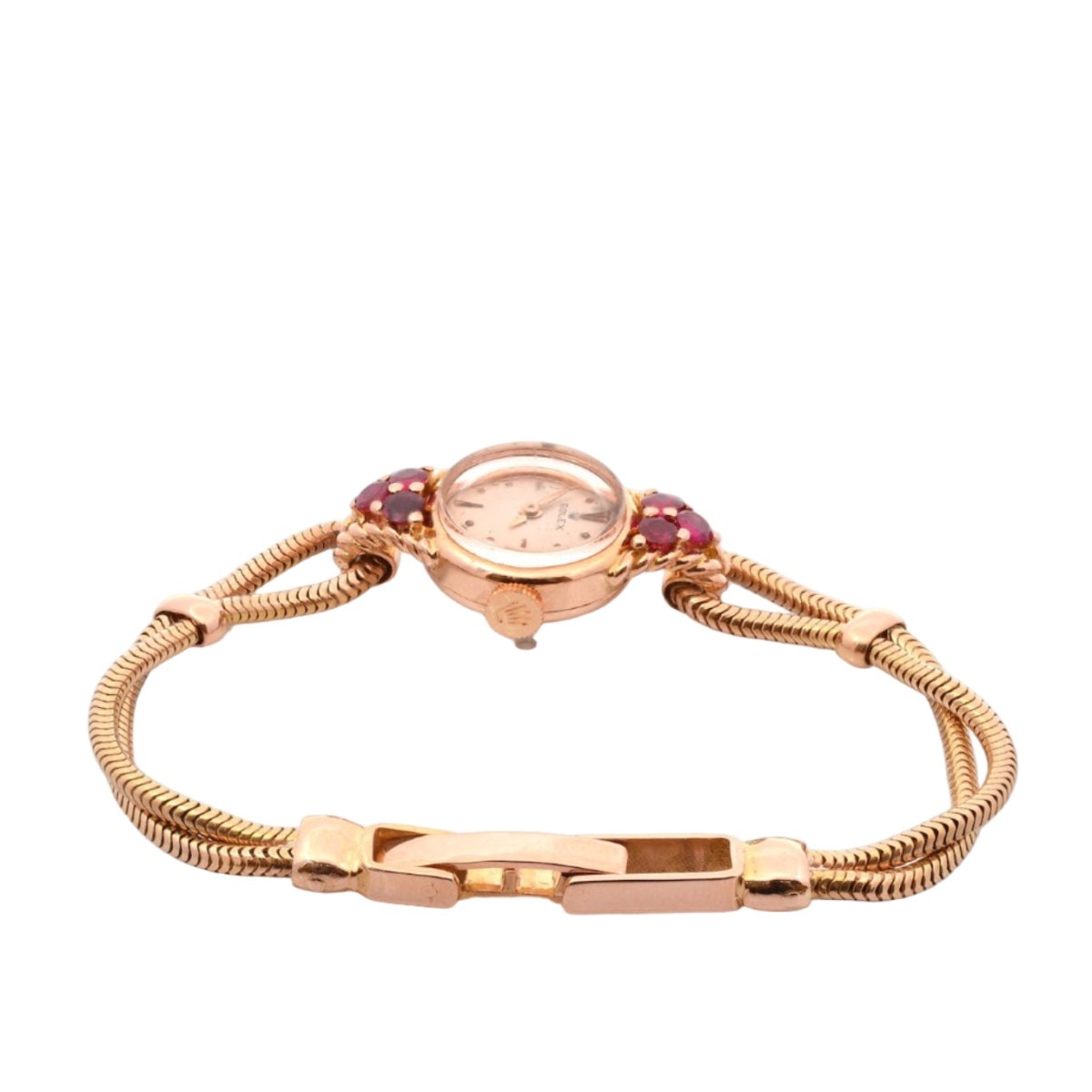 Montre ROLEX en or jaune et rubis - Castafiore