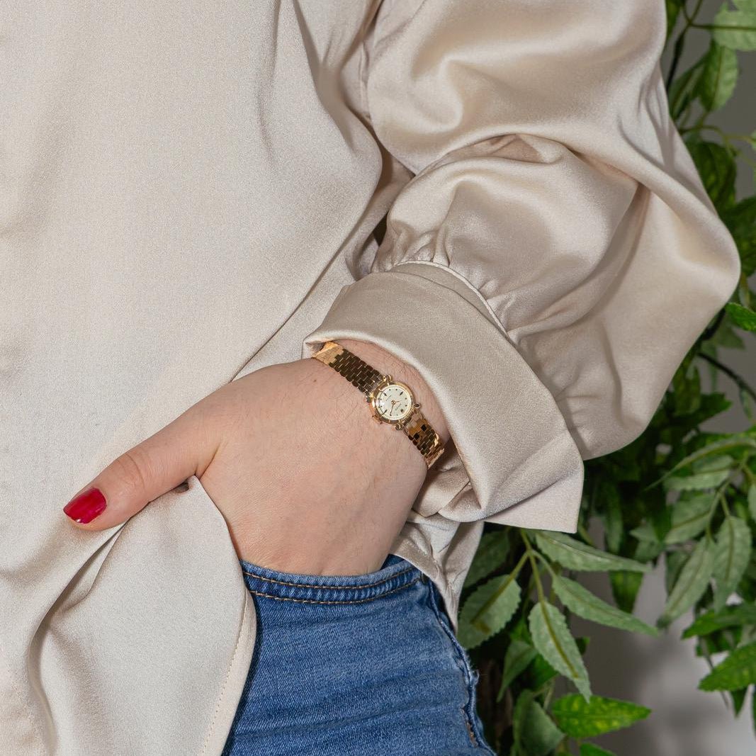 Montre ROLEX en or rose - Castafiore