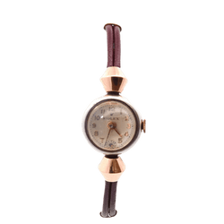 Montre ROLEX en or rose, acier et cuir - Castafiore