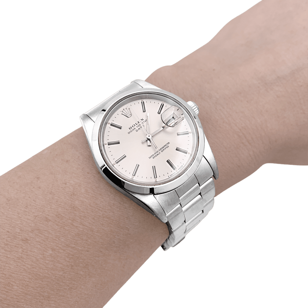 Montre ROLEX "Oyster Perpetual Date" en acier et argent - Castafiore