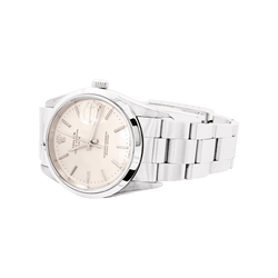 Montre ROLEX "Oyster Perpetual Date" en acier et argent - Castafiore