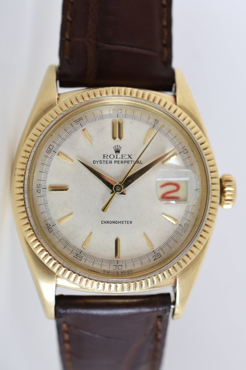 Montre ROLEX "Oyster Perpetual Date Ovettone" en or jaune et cuir - Castafiore