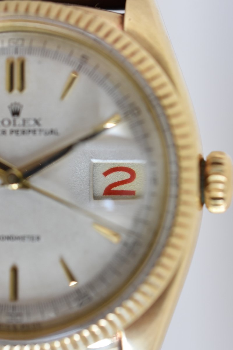 Montre ROLEX "Oyster Perpetual Date Ovettone" en or jaune et cuir - Castafiore