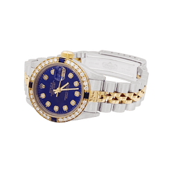 Montre ROLEX "Oyster Perpetual DateJust" en or jaune, acier, saphirs et diamants - Castafiore