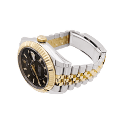 Montre Rolex Sky Dweller en acier et or jaune - Castafiore